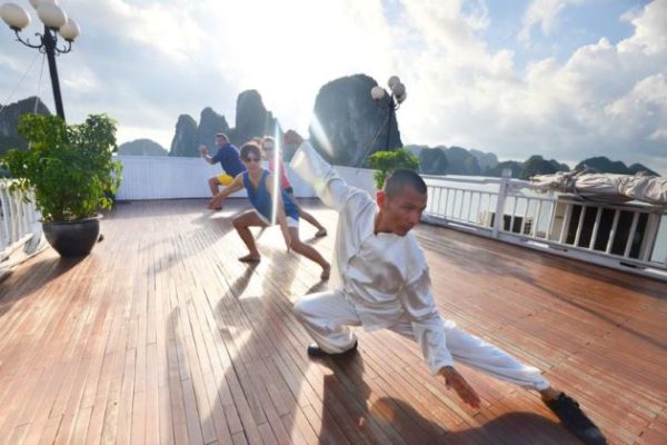 tai chi exercise in halong bay