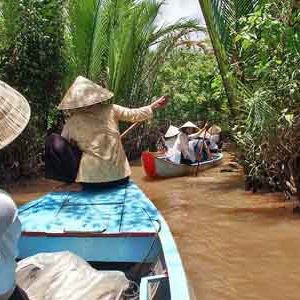 Boat trip throught small canals in Mekong Delta