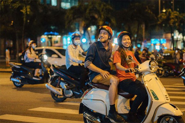 Ho Chi Minh Nightlife on back of Scooter