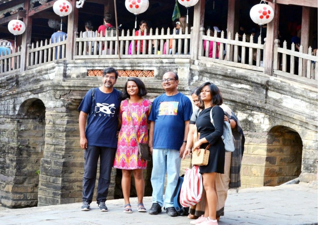 Family photo at Japanese Bridge with a customized itinerary