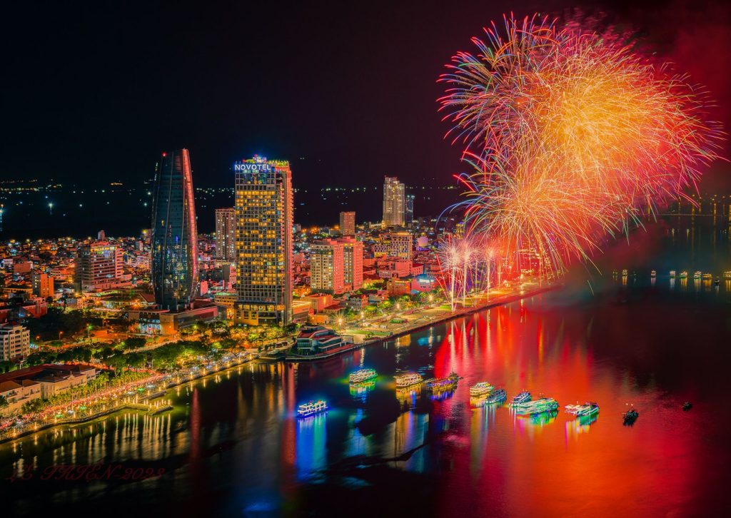 ibrant fireworks display over the Han River and Da Nang skyline at night